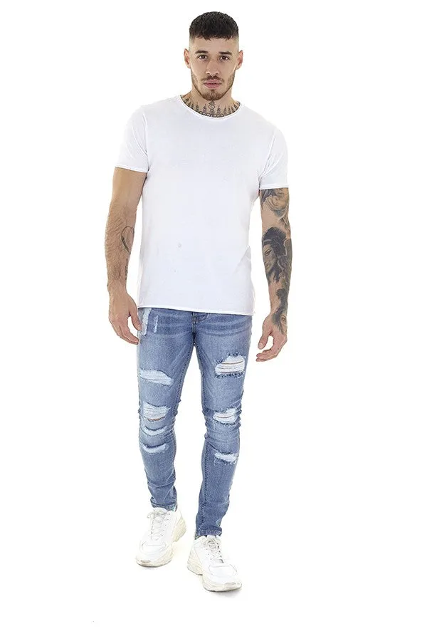 LIGHT WASH RIPPED SKINNY JEANS