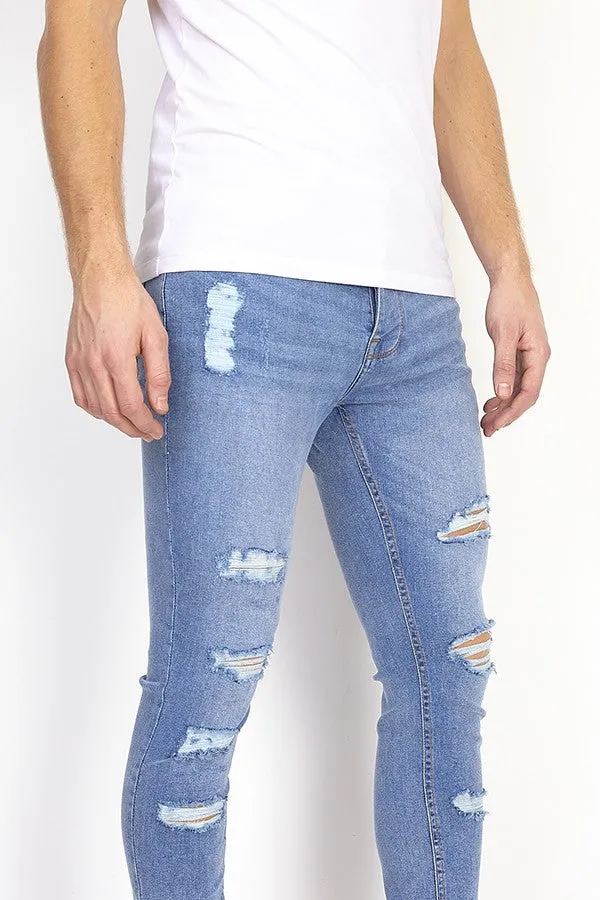 LIGHT WASH RIPPED SKINNY JEANS