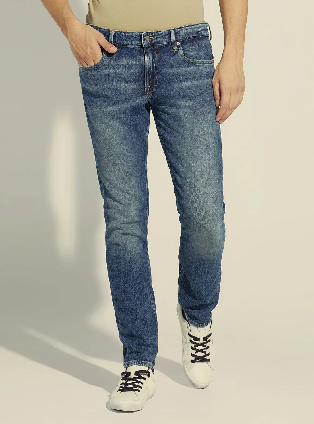 Mid-Rise Slim Tapered Denim Jeans In Hitch Wash